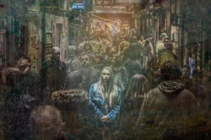 Woman alone in a crowd